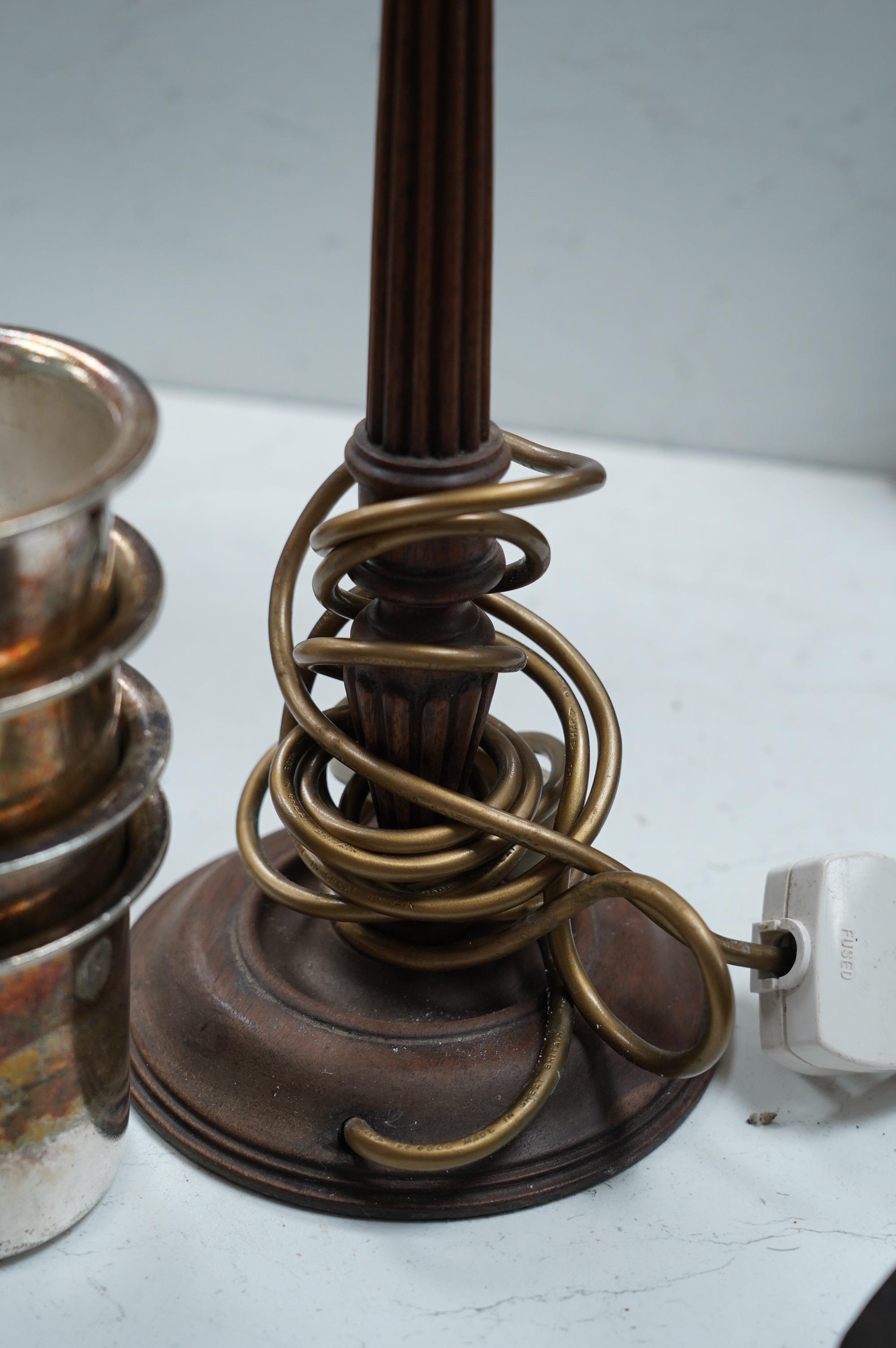 Shipping interest: Four George V Elkington Plate White Star Line beakers, date letters for 1921 & 1922, together with a lamp, tallest 55cm. Condition - poor to fair